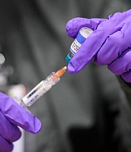 Two doses of the measles-mumps-rubella (MMR) vaccine are 97% effective against the measles virus.
Mandatory Credit:	Annie Rice/Reuters via CNN Newsource