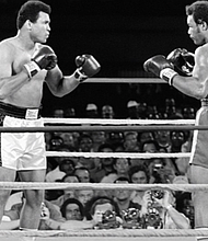 George Foreman in the ring with Muhammad Ali - The Rumble in the Jungle/credit IG-biggeorgeforeman