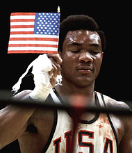George Foreman winning the gold medal the 1968 Olympics in Mexico City/credit IG-biggeorgeforeman