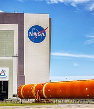 The core stage for NASA's Space Launch System rocket is moved from the Pegasus barge to the Vehicle Assembly Building on July 23, 2024.
Mandatory Credit:	Ricardo Ramirez Buxeda/Orlando Sentinel/TNS/GEtty Images/File via CNN Newsource