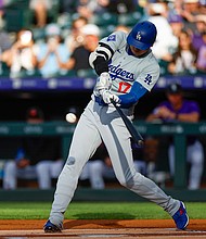 Pro baseball players train for optimal rotational ability to maximize power and prevent injury. Here, the Los Angeles Dodgers' Shohei Ohtani swings in a 2024 game against the Colorado Rockies.
Mandatory Credit:	Brandon Sloter/Image Of Sport/Getty Images via CNN Newsource