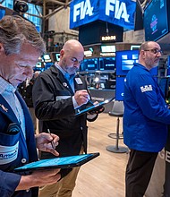 Traders work on the floor of the New York Stock Exchange.
Mandatory Credit:	Spencer Platt/Getty Images via CNN Newsource