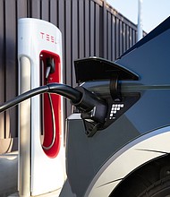 The Hyundai NACS adapter plugged into a 2024 Hyundai IONIQ 5 in Fountain Valley, Calif. on March 5, 2025.