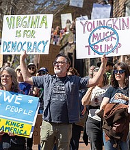 Hundreds gather at St. John’s Church in Richmond for The “No Kings in America” protest held during a reenactment marking the 250th anniversary of Patrick Henry’s revolutionary speech.