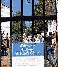 Protesters gather outside St. John’s Church during a reenactment marking the 250th anniversary of Patrick Henry’s iconic revolutionary speech.