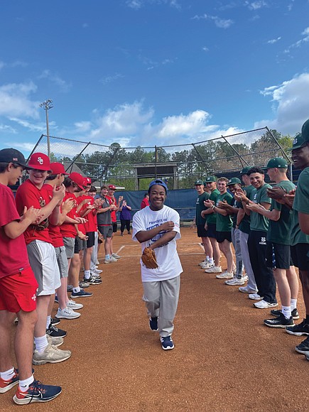 Rows of applause from players at last year’s Pass the Hat Event, an annual game between Benedictine College Preparatory and St. Christopher’s School to raise funds and awareness for Jacob’s Chance’s inclusive and accessible programs.