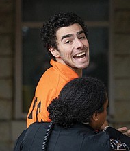 Luigi Mangione is taken into the Blair County Courthouse on Dec. 10, 2024, in Hollidaysburg, Pa.