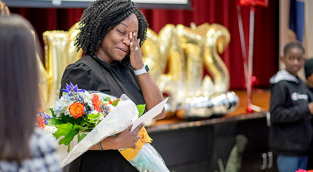 Arainau “Rainy” Neal, principal of Maude Trevvett Elementary School, reacts to the news that she is Henrico County Public Schools’ 2025 REB winner. She was surprised at the school on March 14.
