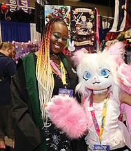 Travy and her daughter, Kaira, dress as their favorite characters.
