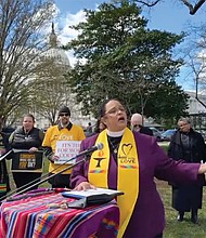 The Rev. Sofía Betancourt addresses an interfaith “Faithful Witness Wednesdays” vigil near the U.S. Capitol, March 26, in Washington, D.C.