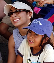 Anais Saenz with her mother/Photo credit: Camp Periwinkle Photographer