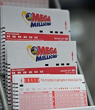 The price of a Mega Millions ticket jumped to $5.
Mandatory Credit:	Angela Weiss/AFP/Getty Images via CNN Newsource