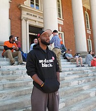 Then-Ph.D. student A.D. Carson, protests at Clemson University in 2016 with faculty, staff and students.