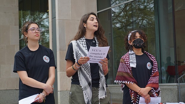 Sereen Haddad, center, speaks during a press conference outside the James Branch Cabell Library last week, joined by fellow VCU students and Students for Justice in Palestine members Cristina Sayegh and Kenza Zitouni.