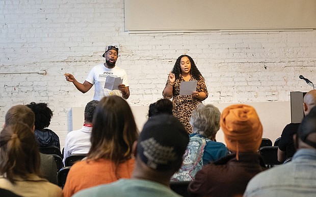 Poet Roscoe Burnems, (left) engages with the crowd at last year’s Richmond Poetry Fest. This
year’s free festival, hosted April 11-12 at VisArts, features workshops, a youth anthology reading and Burnems hosting the 1-2-3 Slam competition.