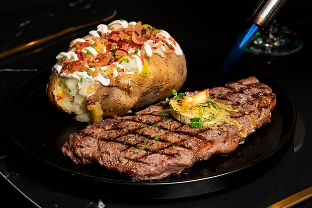 Doves Steak Night Thursdays features a delicious, juicy steak accompanied by a fresh house salad and baked potato for just $30.

Photo: Courtesy of Doves Restaurant