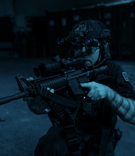 Master-at-Arms 2nd Class Eric Holy/Photo by Seaman Nathan Huang 
USS Iwo Jima (LHD 7)