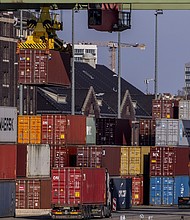 Shipping containers stacked in a container port in Berlin.
Mandatory Credit:	Maja Hitij/Getty Images via CNN Newsource