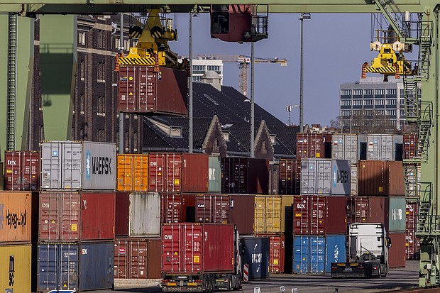 Shipping containers stacked in a container port in Berlin.
Mandatory Credit:	Maja Hitij/Getty Images via CNN Newsource