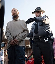 Cody Balmer is escorted from court after an arraignment hearing on Monday in Harrisburg, Pennsylvania.
Mandatory Credit:	Mingson Lau/AP via CNN Newsource