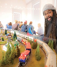 A visitor enthusiastically watches the model train displays at the Ashland Train Day. This year’s event is on Saturday, April 26, from 11 a.m. to 4 p.m.