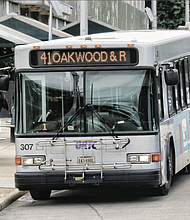 A Greater Richmond Transit Company bus rolls through the city as GRTC officials confirm that zero-fare rides will continue through fiscal year 2026—pending final budget approval.
