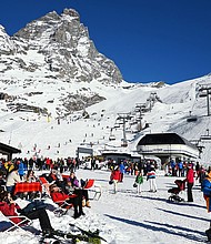 Tourists rest in the sun in the alpine resort of Breuil-Cervinia, northwestern Italy.
Mandatory Credit:	Vincenzo Pinto/AFP/Getty Images via CNN Newsource