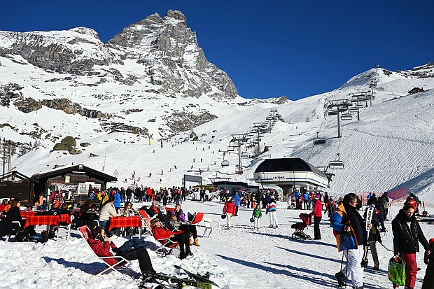 Tourists rest in the sun in the alpine resort of Breuil-Cervinia, northwestern Italy.
Mandatory Credit:	Vincenzo Pinto/AFP/Getty Images via CNN Newsource