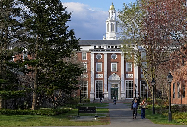 People walk on the business school campus of Harvard University in Cambridge, Massachusetts, on April 15.
Mandatory Credit:	Faith Ninivaggi/Reuters via CNN Newsource