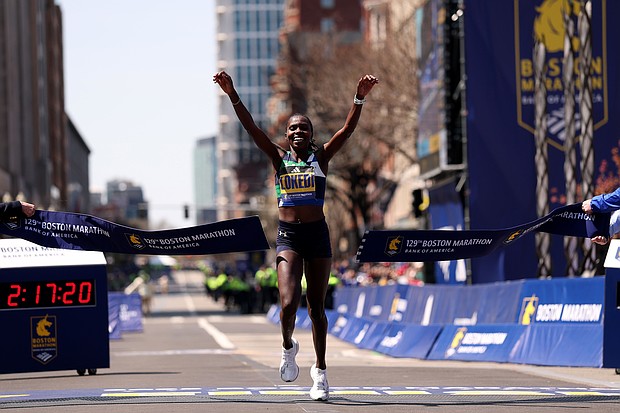 Lokedi sets a new course record at the Boston Marathon.
Mandatory Credit:	Maddie Meyer/Getty Images via CNN Newsource
