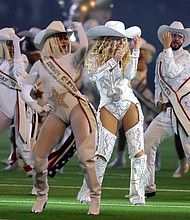 Beyoncé performs during the halftime show for the game between the Baltimore Ravens and the Houston Texans in Houston in December.
Mandatory Credit:	Alex Slitz/Getty Images via CNN Newsource