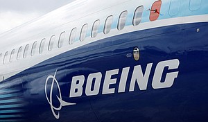 The Boeing logo is seen on the side of a Boeing 737 MAX at the Farnborough International Airshow in Farnborough, Britain, on July 20, 2022.
Mandatory Credit:	Peter Cziborra/Reuters via CNN Newsource