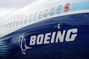The Boeing logo is seen on the side of a Boeing 737 MAX at the Farnborough International Airshow in Farnborough, Britain, on July 20, 2022.
Mandatory Credit:	Peter Cziborra/Reuters via CNN Newsource