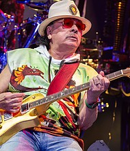 A mourner looks upon a portrait of the late Pope Francis at the Rio de Janeiro Metropolitan Cathedral, in Brazil, on April 21. The funeral for the 88-year-old pontiff will take place at the Vatican, on Saturday.
Mandatory Credit:	Buda Mendes/Getty Images via CNN Newsource