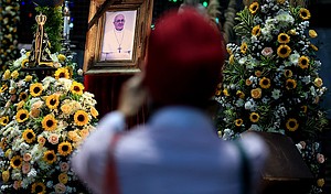 A mourner looks upon a portrait of the late Pope Francis at the Rio de Janeiro Metropolitan Cathedral, in Brazil, on April 21. The funeral for the 88-year-old pontiff will take place at the Vatican, on Saturday.
Mandatory Credit:	Buda Mendes/Getty Images via CNN Newsource
