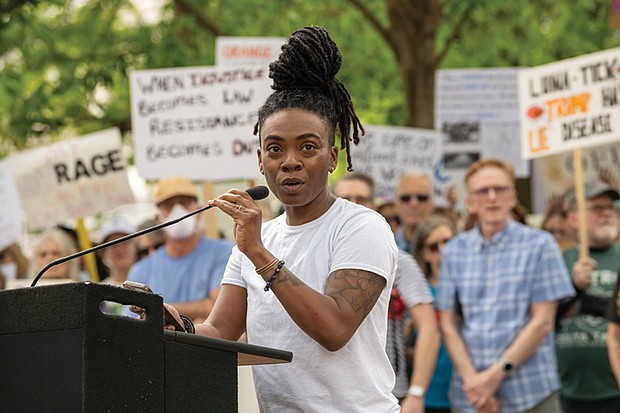 Diversity Richmond Program Director Quing Imzadi spoke to a crowd of demonstrators Saturday, April 19, at Capitol Square during the “Freedom Rising” rally.
