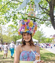 Erin Klich participates in the longtime bonnet contest tradition.