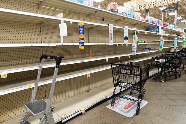 Empty shelves in the water bottle aisle at Carytown Kroger on Jan. 7, two hours after the boil water advisory following a failure at the city water treatment facility.