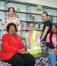 Carolyn Lemon, a VCCS Chancellor’s Award for Leadership in Philanthropy recipient, visits with students at Gloucester High School.