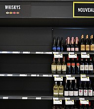 Empty space on a shelf where American-made liquor had been at a liquor store in Montreal, Canada.
Mandatory Credit:	Graham Hughes/Bloomberg/Getty Images via CNN Newsource