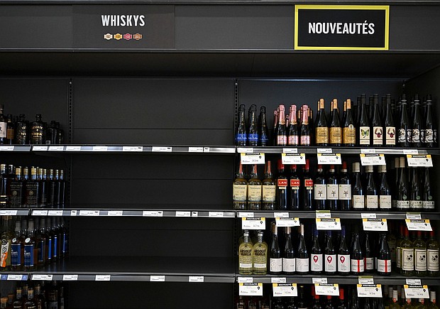 Empty space on a shelf where American-made liquor had been at a liquor store in Montreal, Canada.
Mandatory Credit:	Graham Hughes/Bloomberg/Getty Images via CNN Newsource