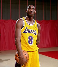The jersey worn by Kobe Bryant during his rookie Los Angeles Lakers season in 1996-97 sold for a record price at auction.
Mandatory Credit:	Scott Cunningham/NBAE/Getty Images via CNN Newsource