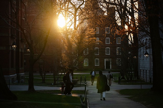 Students walk through Harvard University's campus on April 17 in Cambridge, Massachusetts.
Mandatory Credit:	Sophie Park/Getty Images via CNN Newsource