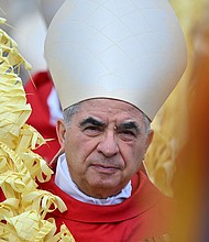 Italian Cardinal Giovanni Angelo Becciu takes par in the procession of the Palm Sunday mass on April 2, 2023 at St. Peter's Square in the Vatican.
Mandatory Credit:	Filippo Monteforte/AFP via Getty Images via CNN Newsource