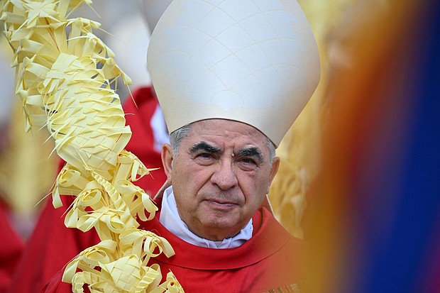 Italian Cardinal Giovanni Angelo Becciu takes par in the procession of the Palm Sunday mass on April 2, 2023 at St. Peter's Square in the Vatican.
Mandatory Credit:	Filippo Monteforte/AFP via Getty Images via CNN Newsource