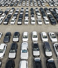 New vehicles are parked on the pier at the Mercedes Benz Vehicle Preparation Center in Baltimore, Maryland, on March 31.
Mandatory Credit:	Jim Watson/AFP/Getty Images via CNN Newsource