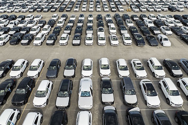 New vehicles are parked on the pier at the Mercedes Benz Vehicle Preparation Center in Baltimore, Maryland, on March 31.
Mandatory Credit:	Jim Watson/AFP/Getty Images via CNN Newsource