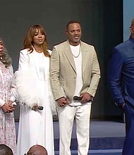 Bishop T.D. Jakes, right, speaks at The Potter’s House with his wife Serita, from left, daughter, Sarah Jakes Roberts, and her husband, Touré Roberts, Sunday, April 27, in Dallas.
