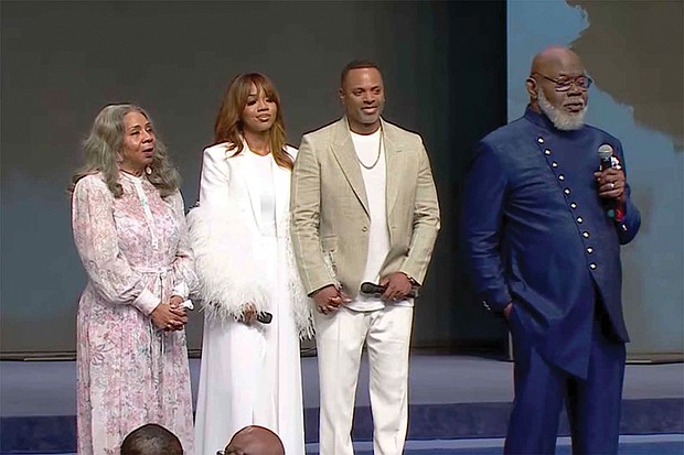 Bishop T.D. Jakes, right, speaks at The Potter’s House with his wife Serita, from left, daughter, Sarah Jakes Roberts, and her husband, Touré Roberts, Sunday, April 27, in Dallas.
