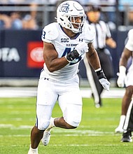 Richmond native Kris Trinidad, a defensive end at Old Dominion University, makes his mark on the field as he learns the ropes of college athletics.